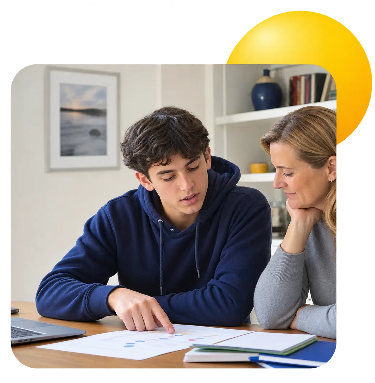 Mother and teenage son reviewing college plans at a table