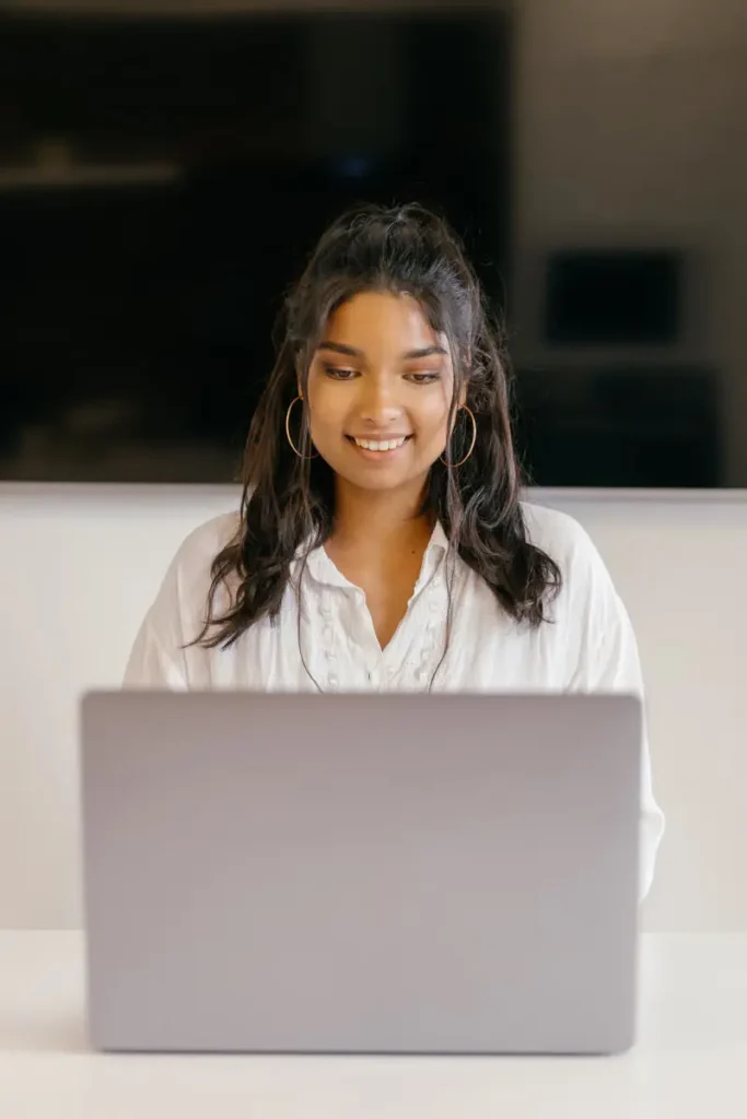 Student on a video call at her laptop